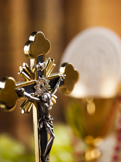 A Crucifix, the Eucharist and Chalice